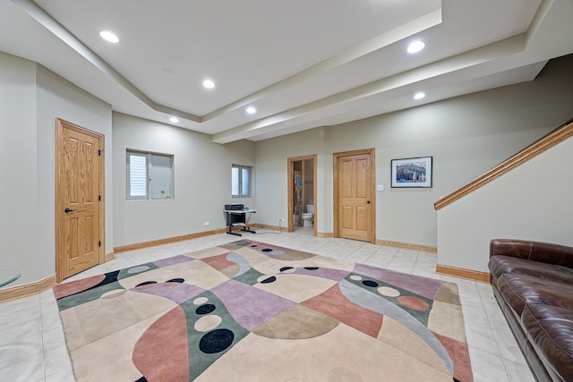 10732 Revere Rd, Mokena, IL 60448 - living room featuring a tray ceiling, recessed lighting, and light tile patterned floors