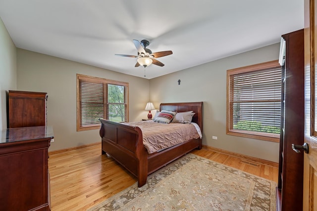10732 Revere Rd, Mokena, IL 60448 - bedroom featuring light wood-style flooring and a ceiling fan