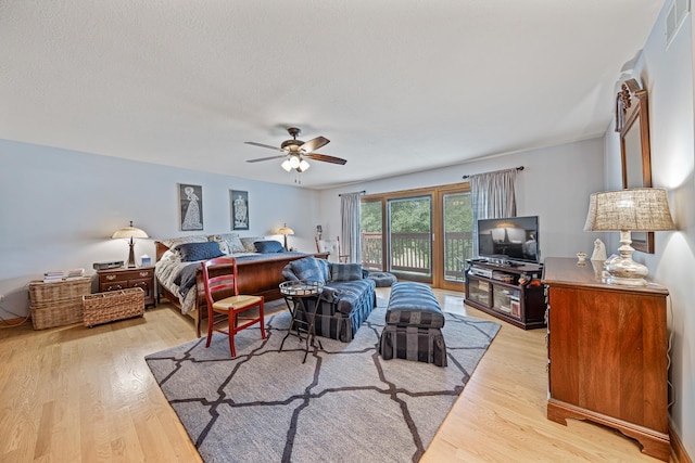 10732 Revere Rd, Mokena, IL 60448 - bedroom with light wood-style floors, access to exterior, and ceiling fan