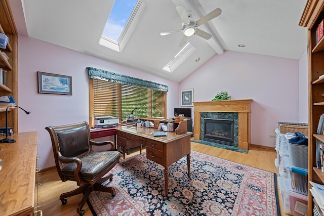 10732 Revere Rd, Mokena, IL 60448 - office space with a ceiling fan, wood finished floors, a skylight, and a high end fireplace