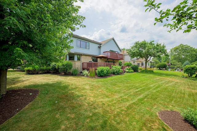 10732 Revere Rd, Mokena, IL 60448 - view of green lawn with a deck