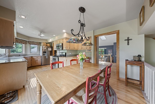 10732 Revere Rd, Mokena, IL 60448 - dining space with healthy amount of natural light, a ceiling fan, light wood finished floors, and recessed lighting