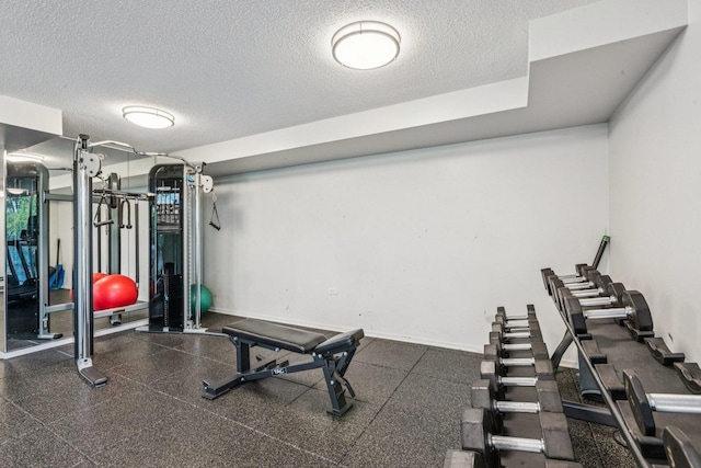 800 Elgin Rd Unit 1017, Evanston, IL 60201 - exercise area with a textured ceiling and baseboards