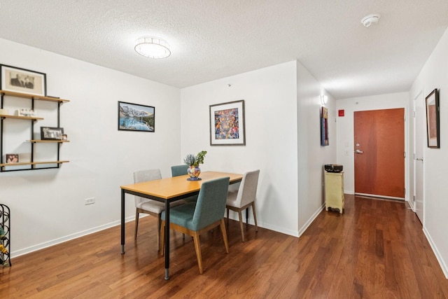 800 Elgin Rd Unit 1017, Evanston, IL 60201 - dining area with wood finished floors and a textured ceiling