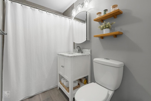 7314 W 113th Pl, Worth, IL 60482 - bathroom with vanity, wood finished floors, and a shower with curtain