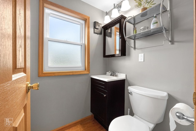 7314 W 113th Pl, Worth, IL 60482 - half bath with vanity and wood finished floors