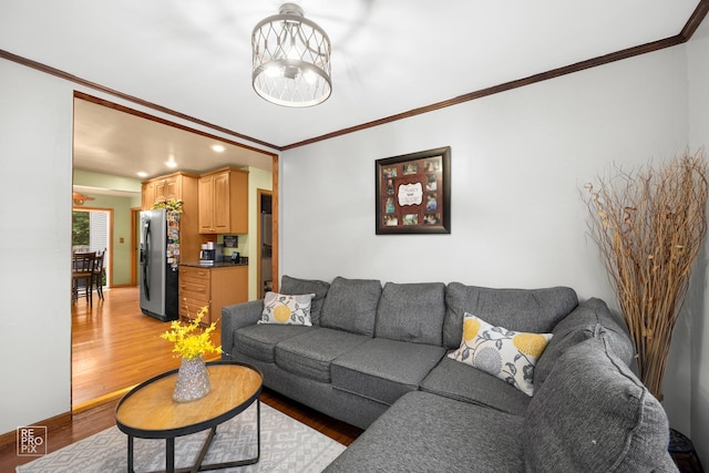 7314 W 113th Pl, Worth, IL 60482 - living area featuring light wood finished floors, crown molding, a chandelier, and recessed lighting