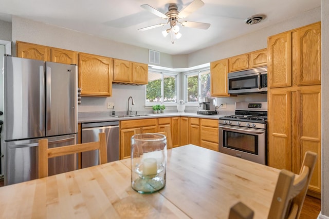 817 N Gibbons Ave, Arlington Heights, IL 60004 - kitchen with appliances with stainless steel finishes, ceiling fan, wood counters, and light brown cabinetry