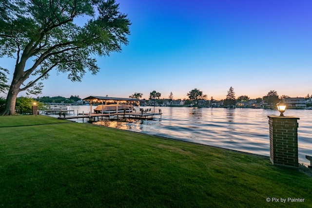 1913 N Woodlawn Park Ave, Mchenry, IL 60051 - dock area with boat lift, a yard, and a water view