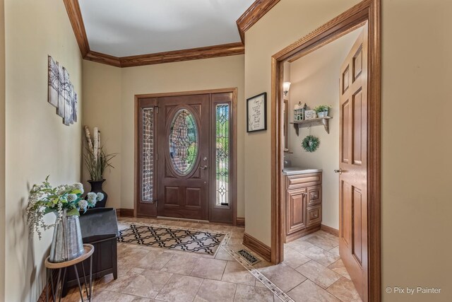 1913 N Woodlawn Park Ave, Mchenry, IL 60051 - entryway with ornamental molding and light stone finish floors