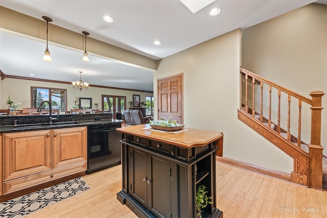 1913 N Woodlawn Park Ave, Mchenry, IL 60051 - kitchen with dishwasher, a chandelier, light wood-type flooring, pendant lighting, and dark stone counters