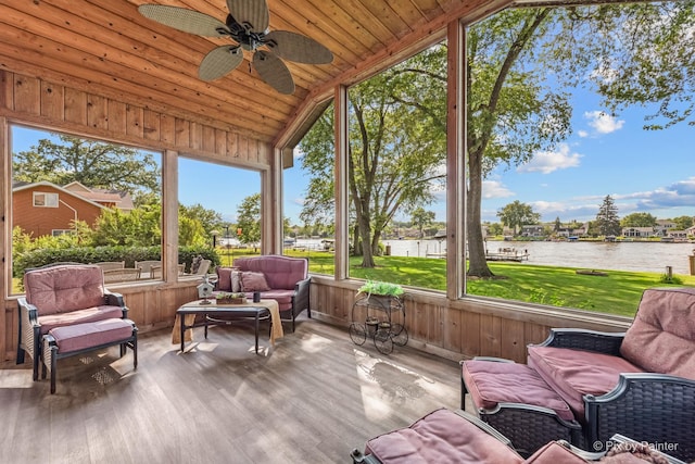 1913 N Woodlawn Park Ave, Mchenry, IL 60051 - sunroom / solarium with a water view, lofted ceiling, a ceiling fan, and plenty of natural light