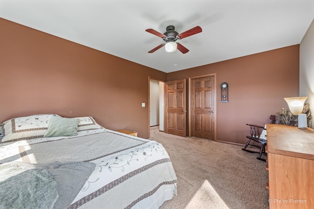 1913 N Woodlawn Park Ave, Mchenry, IL 60051 - carpeted bedroom with ceiling fan and baseboards