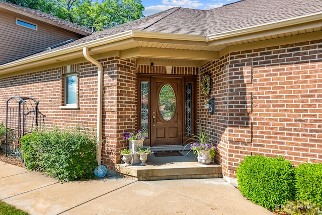 1913 N Woodlawn Park Ave, Mchenry, IL 60051 - entrance to property with brick siding and roof with shingles