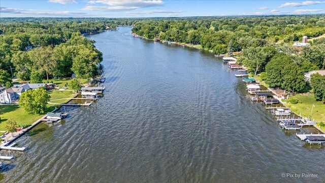 1913 N Woodlawn Park Ave, Mchenry, IL 60051 - aerial overview of property's location featuring a nearby body of water and a heavily wooded area
