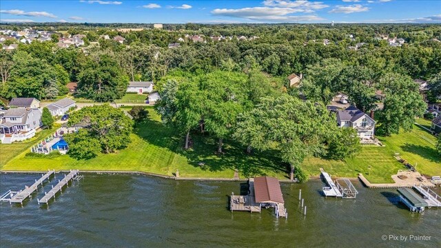 1913 N Woodlawn Park Ave, Mchenry, IL 60051 - aerial view of property and surrounding area with a nearby body of water and a heavily wooded area
