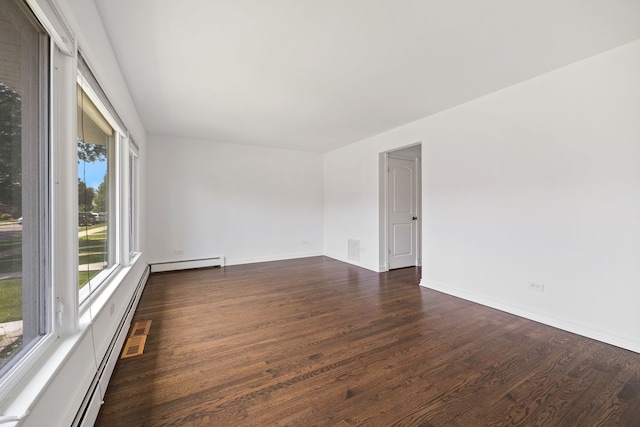 7004 W School St, Chicago, IL 60634 - unfurnished room featuring dark wood-style flooring and baseboards