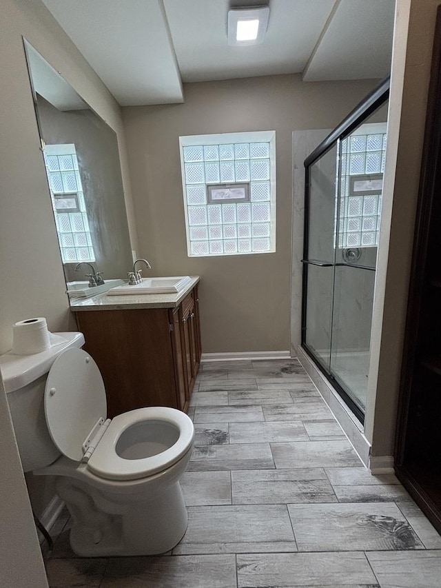 6638 S Albany Ave, Chicago, IL 60629 - bathroom with a shower stall, vanity, and wood tiled floors