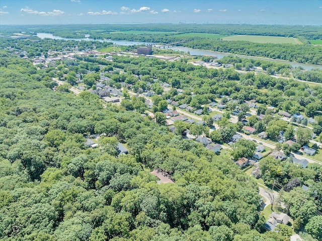 555/557 W Bluff St, Marseilles, IL 61341 - aerial view of a nearby body of water and a heavily wooded area