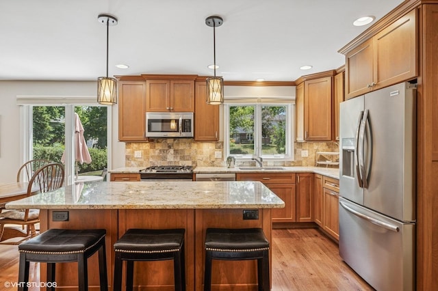 1355 W Kenilworth Ave, Palatine, IL 60067 - kitchen with stainless steel appliances, healthy amount of natural light, a kitchen bar, and recessed lighting