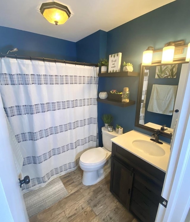 1615 Meadow Ln, Mchenry, IL 60050 - full bath with wood finished floors, vanity, and a shower with shower curtain