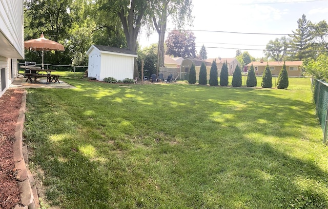 1615 Meadow Ln, Mchenry, IL 60050 - fenced backyard featuring a shed and a patio area