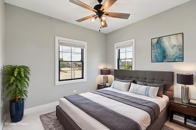 220 S Primrose Dr, Coal City, IL 60416 - carpeted bedroom with baseboards and ceiling fan