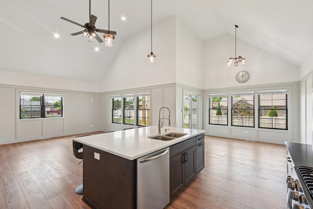 220 S Primrose Dr, Coal City, IL 60416 - kitchen with open floor plan, appliances with stainless steel finishes, high vaulted ceiling, wood-type flooring, and ceiling fan