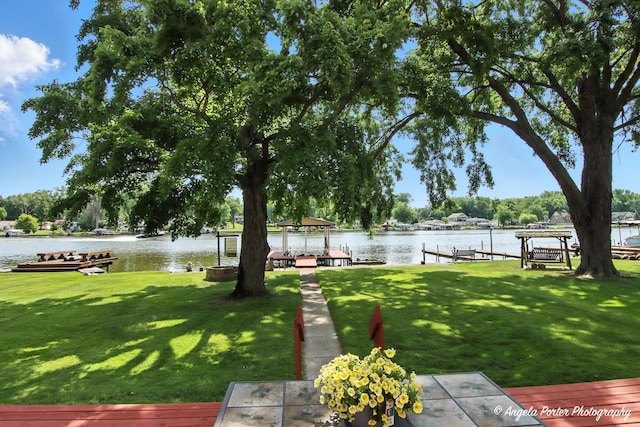 312 Country Club Dr, Mchenry, IL 60050 - view of green lawn with a water view and a boat dock