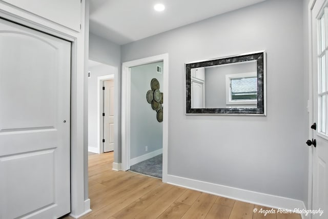 312 Country Club Dr, Mchenry, IL 60050 - corridor featuring wood finished floors, healthy amount of natural light, and recessed lighting