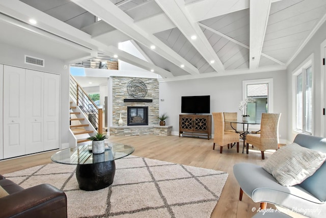 312 Country Club Dr, Mchenry, IL 60050 - living area with wood finished floors, stairway, recessed lighting, and a stone fireplace