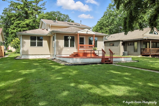 312 Country Club Dr, Mchenry, IL 60050 - rear view of property featuring a wooden deck, a lawn, and a shingled roof