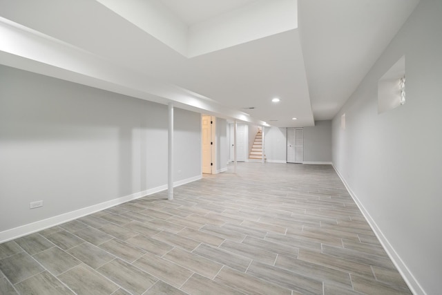 8858 S Calumet Ave, Chicago, IL 60619 - finished below grade area featuring stairway, recessed lighting, and light wood-type flooring