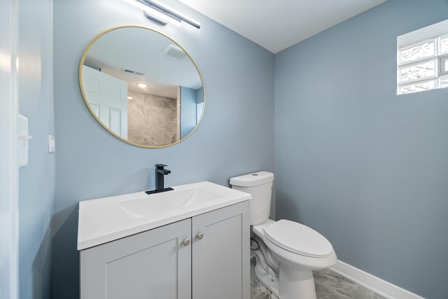 8858 S Calumet Ave, Chicago, IL 60619 - bathroom with marble finish floors and vanity