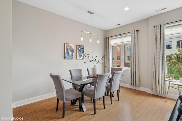 3516 N Ashland Ave N Unit 3S, Chicago, IL 60657 - dining area with light wood-style floors and recessed lighting