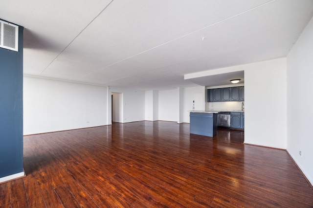2005 S Finley Rd Unit 1204, Lombard, IL 60148 - unfurnished living room featuring dark wood-type flooring and baseboards
