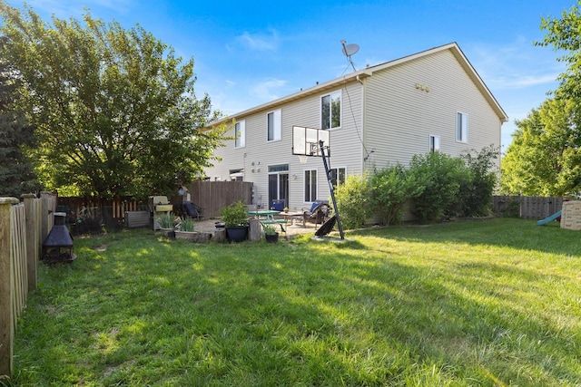 21549 Fulton Ct, Plainfield, IL 60544 - back of house with a fenced backyard and a patio