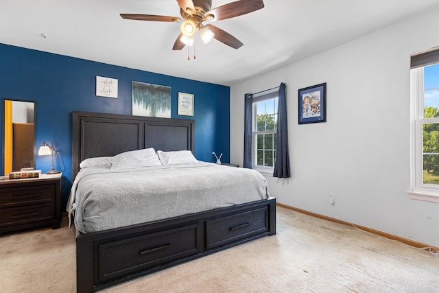 21549 Fulton Ct, Plainfield, IL 60544 - bedroom featuring light colored carpet, multiple windows, and ceiling fan