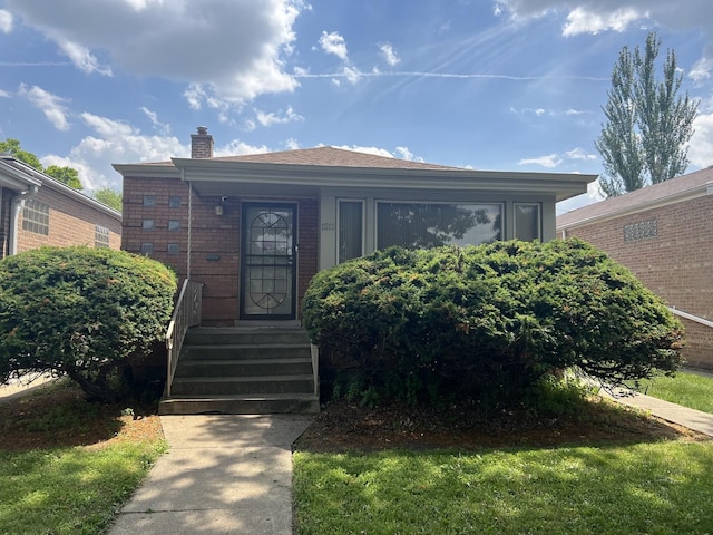 1513 E 86th Pl, Chicago, IL 60619 - view of front of home featuring a chimney