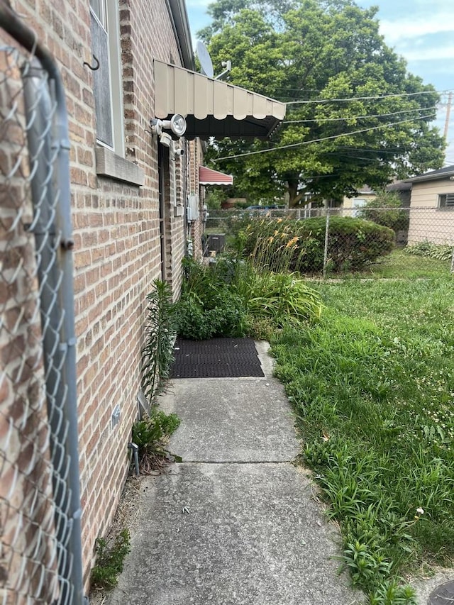 1513 E 86th Pl, Chicago, IL 60619 - view of home's exterior featuring brick siding
