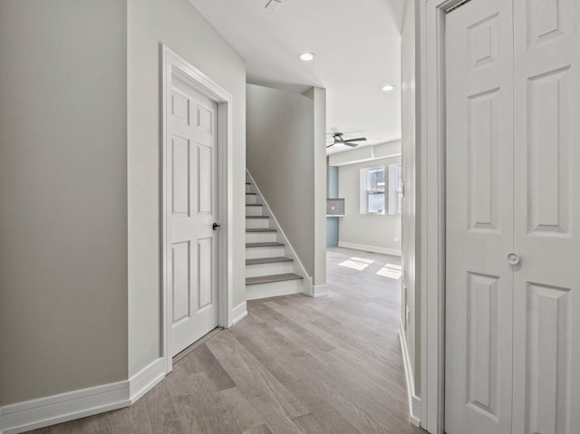 7711 S Ridgeland Ave, Chicago, IL 60649 - corridor featuring wood finished floors, stairs, and recessed lighting