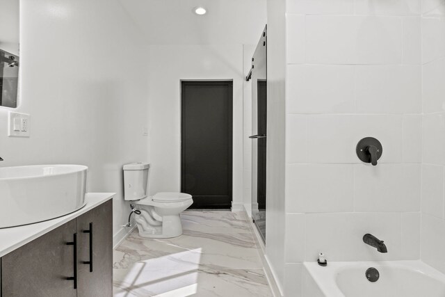 7711 S Ridgeland Ave, Chicago, IL 60649 - full bath featuring vanity, marble finish flooring,  shower combination, and recessed lighting
