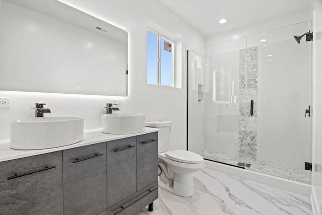 7711 S Ridgeland Ave, Chicago, IL 60649 - bathroom with double vanity, a shower stall, marble finish floors, and recessed lighting