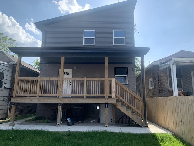 7711 S Ridgeland Ave, Chicago, IL 60649 - back of property with stairway and a porch