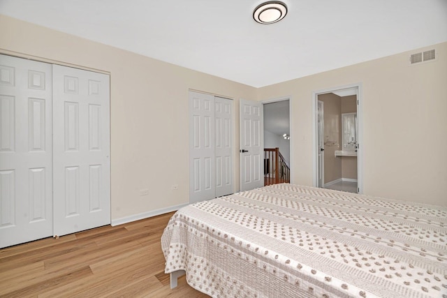 16636 Winding Creek Rd, Plainfield, IL 60586 - bedroom with multiple closets, light wood-type flooring, and ensuite bath
