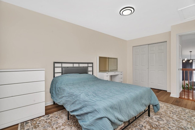 16636 Winding Creek Rd, Plainfield, IL 60586 - bedroom featuring wood finished floors, a closet, and attic access