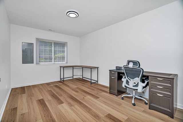 16636 Winding Creek Rd, Plainfield, IL 60586 - home office featuring electric panel and light wood-style floors