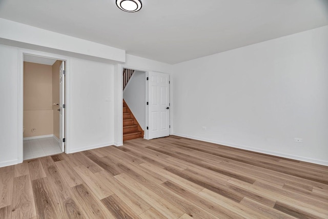 16636 Winding Creek Rd, Plainfield, IL 60586 - empty room with light wood-style floors and stairway