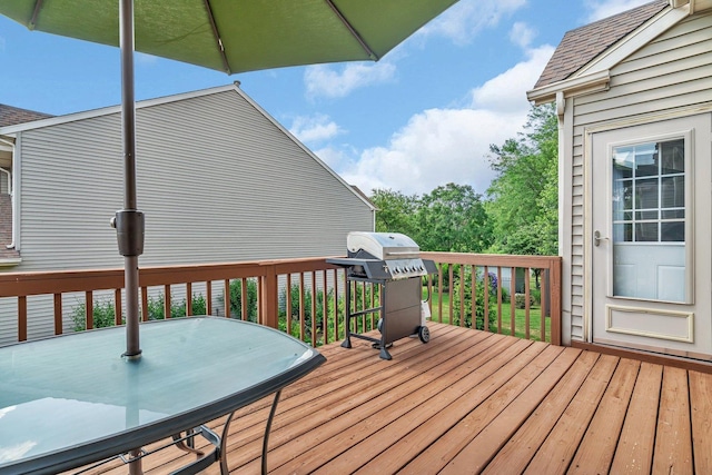 16636 Winding Creek Rd, Plainfield, IL 60586 - wooden deck with grilling area and outdoor dining space