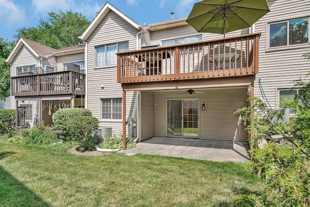 16636 Winding Creek Rd, Plainfield, IL 60586 - rear view of property with a lawn, a patio, a ceiling fan, and a balcony